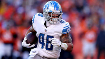 DENVER, COLORADO - DECEMBER 12: Craig Reynolds #46 of the Detroit Lions runs with the ball against the Denver Broncos during the second quarter at Empower Field At Mile High on December 12, 2021 in Denver, Colorado. (Photo by Matthew Stockman/Getty Images)