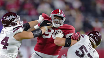 TUSCALOOSA, AL - OCTOBER 22: Jamil Burroughs #98 of the Alabama Crimson Tide battles Steven Losoya III #64 and Jackson Cannon #54 of the Mississippi State Bulldogs at Bryant-Denny Stadium on October 22, 2022 in Tuscaloosa, Alabama. (Photo by Brandon Sumrall/Getty Images)