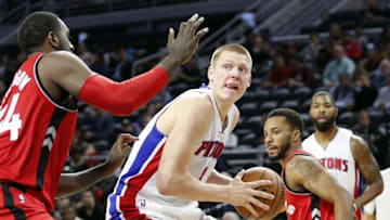 Oct 19, 2016; Auburn Hills, MI, USA; Detroit Pistons forward Henry Ellenson (8) gets defended by Toronto Raptors forward Patrick Patterson (54) during the third quarter at The Palace of Auburn Hills. Raptors won 103-92. Mandatory Credit: Raj Mehta-USA TODAY Sports