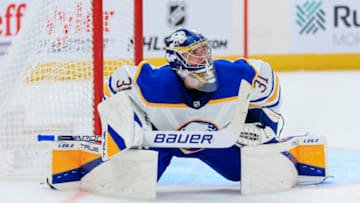 Sep 28, 2022; Columbus, Ohio, USA; Buffalo Sabres goaltender Eric Comrie (31) stretches on the ice after making a save against the Columbus Blue Jackets in the second period at Nationwide Arena. Mandatory Credit: Aaron Doster-USA TODAY Sports