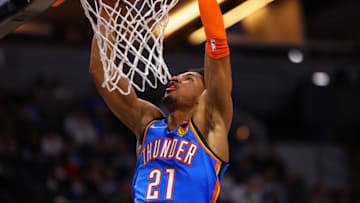 Aaron Wiggins #21 of the Oklahoma City Thunder dunks the ball during the second quarter against the Minnesota Timberwolves at Target Center on January 5, 2022 in Minneapolis, Minnesota. NOTE TO USER: User expressly acknowledges and agrees that, by downloading and or using this photograph, User is consenting to the terms and conditions of the Getty Images License Agreement. (Photo by Harrison Barden/Getty Images)