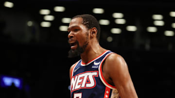 NEW YORK, NEW YORK - DECEMBER 16: Kevin Durant #7 of the Brooklyn Nets celebrates a shot against the Philadelphia 76ers during their game at Barclays Center on December 16, 2021 in New York City. NOTE TO USER: User expressly acknowledges and agrees that, by downloading and or using this photograph, User is consenting to the terms and conditions of the Getty Images License Agreement. (Photo by Al Bello/Getty Images)