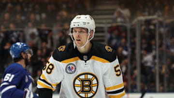 TORONTO, ONTARIO - NOVEMBER 15: Urho Vaakanainen #58 of the Boston Bruins skates against the Toronto Maple Leafs at the Scotiabank Arena on November 15, 2019 in Toronto, Ontario, Canada. (Photo by Bruce Bennett/Getty Images)