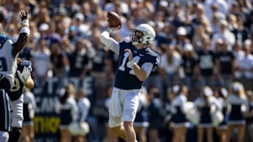 STATE COLLEGE, PA - SEPTEMBER 25: Sean Clifford #14 of the Penn State Nittany Lions throws a pass for a touchdown to Jahan Dotson #5 (not pictured) during the first half of the game against the Villanova Wildcats at Beaver Stadium on September 25, 2021 in State College, Pennsylvania. (Photo by Scott Taetsch/Getty Images)