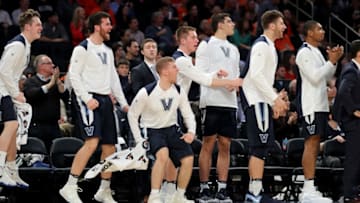 NEW YORK, NY - DECEMBER 05: Members of the Villanova Wildcats bench react to a defensive play by Bridges