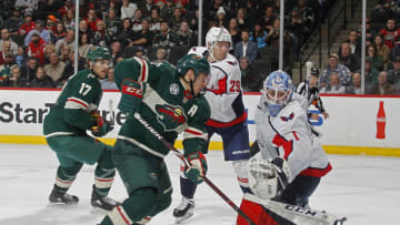 ST. PAUL, MN - NOVEMBER 13: Zach Parise #11 of the Minnesota Wild chases a puck that gets behind Pheonix Copley #1 of the Washington Capitals during a game between the Minnesota Wild and Washington Capitals at Xcel Energy Center on November 13, 2018 in St. Paul, Minnesota. The puck would find it's way to the back of the net and Matt Dumba #24 of the Minnesota Wild would be credited with the 3rd period power play goal as the Capitals defeated the Wild 5-2.(Photo by Bruce Kluckhohn/NHLI via Getty Images)