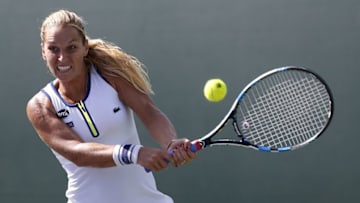 Mar 23, 2016; Key Biscayne, FL, USA; Dominika Cibulkova hits a backhand against Johanna Larsson (not pictured) during day two of the Miami Open at Crandon Park Tennis Center. Cibulkova won 4-6, 6-1, 6-2. Mandatory Credit: Geoff Burke-USA TODAY Sports