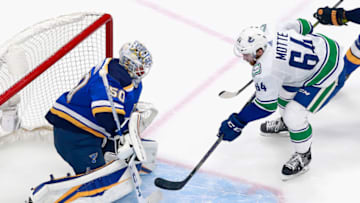 EDMONTON, ALBERTA - AUGUST 14: Jordan Binnington #50 of the St. Louis Blues makes the first period save on Tyler Motte #64 of the Vancouver Canucks in Game Two of the Western Conference First Round during the 2020 NHL Stanley Cup Playoffs at Rogers Place on August 14, 2020 in Edmonton, Alberta, Canada. (Photo by Jeff Vinnick/Getty Images)