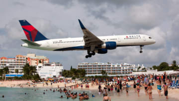 AIRPORT PRINCESS JULIANA, SIMPSON BAY, GUADELOUPE - 2016/12/09: A Delta Airlines Boeing 757 seen landing at airport Princess Juliana just over Maho beach. (Photo by Fabrizio Gandolfo/SOPA Images/LightRocket via Getty Images)