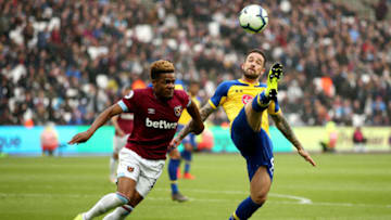 LONDON, ENGLAND - MAY 04: Danny Ings of Southampton is challenged by Grady Diangana of West Ham United during the Premier League match between West Ham United and Southampton FC at London Stadium on May 04, 2019 in London, United Kingdom. (Photo by Marc Atkins/Getty Images)