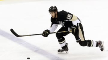 May 13, 2014; Pittsburgh, PA, USA; Pittsburgh Penguins center Brandon Sutter (16) skates after the puck against the New York Rangers during the second period in game seven of the second round of the 2014 Stanley Cup Playoffs at the CONSOL Energy Center. The Rangers won 2-1. Mandatory Credit: Charles LeClaire-USA TODAY Sports