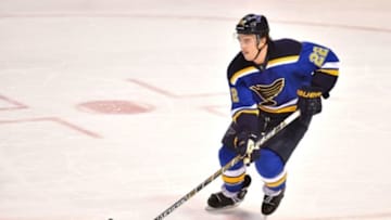 Dec 31, 2015; St. Louis, MO, USA; St. Louis Blues defenseman Kevin Shattenkirk (22) skates with the puck in the game against the Minnesota Wild during the third period at Scottrade Center. The Minnesota Wild defeat the St. Louis Blues 3-1. Mandatory Credit: Jasen Vinlove-USA TODAY Sports