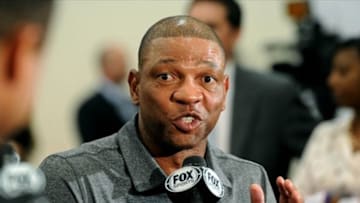 Jun 26, 2013; Playa Vista, CA, USA; Doc Rivers talks with Los Angeles Clippers broadcaster Ralph Lawler (not pictured) after being introduced to the media during a press conference at the Clippers Training Center. Mandatory Credit: Jayne Kamin-Oncea-USA TODAY Sports