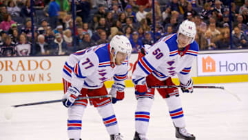 COLUMBUS, OH - NOVEMBER 10: Tony DeAngelo #77 of the New York Rangers and Lias Andersson #50 line up for a face off during the game against the Columbus Blue Jackets on November 10, 2018 at Nationwide Arena in Columbus, Ohio. (Photo by Kirk Irwin/Getty Images)