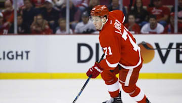 Apr 17, 2016; Detroit, MI, USA; Detroit Red Wings center Dylan Larkin (71) skates with the puck during the first period in game three of the first round of the 2016 Stanley Cup Playoffs at Joe Louis Arena. Mandatory Credit: Rick Osentoski-USA TODAY Sports