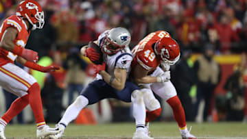 KANSAS CITY, MO - JANUARY 20: Kansas City Chiefs defensive back Daniel Sorensen (49) puts a hard hit on New England Patriots wide receiver Julian Edelman (11) after a 20-yard reception on 3rd and 10 with 13:40 left in overtime of the AFC Championship Game game between the New England Patriots and Kansas City Chiefs on January 20, 2019 at Arrowhead Stadium in Kansas City, MO. (Photo by Scott Winters/Icon Sportswire via Getty Images)