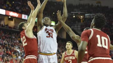 Feb 13, 2016; College Park, MD, USA; Maryland Terrapins center Diamond Stone (33) shoots as Wisconsin Badgers forward Ethan Happ (22) defends during the second half at Xfinity Center. Wisconsin Badgers defeated Maryland Terrapins 70-57. Mandatory Credit: Tommy Gilligan-USA TODAY Sports