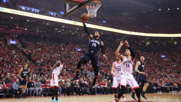 TORONTO, CANADA - APRIL 13: D.J. Augustin #14 of the Orlando Magic goes to the basket against the Toronto Raptors during Game One of Round One of the 2019 NBA Playoffs on April 13, 2019 at the Scotiabank Arena in Toronto, Ontario, Canada. NOTE TO USER: User expressly acknowledges and agrees that, by downloading and or using this Photograph, user is consenting to the terms and conditions of the Getty Images License Agreement. Mandatory Copyright Notice: Copyright 2019 NBAE (Photo by David Sherman/NBAE via Getty Images)