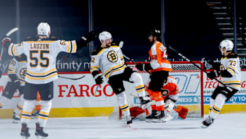 PHILADELPHIA, PENNSYLVANIA - FEBRUARY 05: Sean Kuraly #52 of the Boston Bruins (C) celebrates a goal during the third period against the Philadelphia Flyers at Wells Fargo Center on February 05, 2021 in Philadelphia, Pennsylvania. (Photo by Tim Nwachukwu/Getty Images)