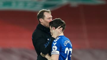 LIVERPOOL, ENGLAND - FEBRUARY 20: Duncan Ferguson the assistant head coach / manager of Everton celebrates and kisses Seamus Coleman of Everton on the forehead at full time during the Premier League match between Liverpool and Everton at Anfield on February 20, 2021 in Liverpool, United Kingdom. Sporting stadiums around the UK remain under strict restrictions due to the Coronavirus Pandemic as Government social distancing laws prohibit fans inside venues resulting in games being played behind closed doors. (Photo by Robbie Jay Barratt - AMA/Getty Images)
