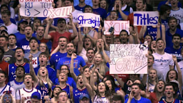 LAWRENCE, KS - FEBRUARY 22: Kansas Jayhawks fans hold up signs as Kansas prepares to win their 13th straight Big 12 Conference Championship during a game against the TCU Horned Frogs at Allen Fieldhouse on February 22, 2017 in Lawrence, Kansas. (Photo by Ed Zurga/Getty Images)