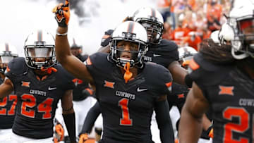 Oct 3, 2015; Stillwater, OK, USA; Oklahoma State Cowboys cornerback Kevin Peterson (1) reacts as his team enters the field before the start of a NCAA college football game against Kansas State at Boone Pickens Stadium. Mandatory Credit: Alonzo Adams-USA TODAY Sports