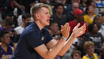 LAS VEGAS, NV - JULY 17: Moritz Wagner #15 of the Los Angeles Lakers cheers from the bench during the 2018 Las Vegas Summer League Championship game against the Portland Trail Blazers on July 17, 2018 at the Thomas & Mack Center in Las Vegas, Nevada. NOTE TO USER: User expressly acknowledges and agrees that, by downloading and/or using this photograph, user is consenting to the terms and conditions of the Getty Images License Agreement. Mandatory Copyright Notice: Copyright 2018 NBAE (Photo by Garrett Ellwood/NBAE via Getty Images)