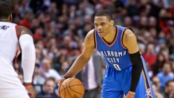 Feb 27, 2015; Portland, OR, USA; Oklahoma City Thunder guard Russell Westbrook (0) brings the ball up court against the Portland Trail Blazers during the third quarter at the Moda Center. Mandatory Credit: Craig Mitchelldyer-USA TODAY Sports