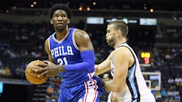 Oct 11, 2016; Memphis, TN, USA; Philadelphia 76ers center Joel Embiid (21) drives against Memphis Grizzlies center Marc Gasol (33) during the first quarter at FedExForum. Mandatory Credit: Nelson Chenault-USA TODAY Sports