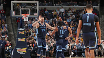MEMPHIS, TN - DECEMBER 26: Marc Gasol #33 and Mike Conley #11 of the Memphis Grizzlies high five during the game against the Cleveland Cavaliers on December 26, 2018 at FedExForum in Memphis, Tennessee. NOTE TO USER: User expressly acknowledges and agrees that, by downloading and or using this photograph, User is consenting to the terms and conditions of the Getty Images License Agreement. Mandatory Copyright Notice: Copyright 2018 NBAE (Photo by Joe Murphy/NBAE via Getty Images)
