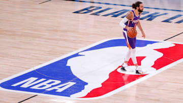 LAKE BUENA VISTA, FLORIDA - AUGUST 04: Ricky Rubio #11 of the Phoenix Suns dribbles downcourt against the LA Clippers at The Arena at ESPN Wide World Of Sports Complex on August 04, 2020 in Lake Buena Vista, Florida. NOTE TO USER: User expressly acknowledges and agrees that, by downloading and or using this photograph, User is consenting to the terms and conditions of the Getty Images License Agreement. (Photo by Kevin C. Cox/Getty Images)
