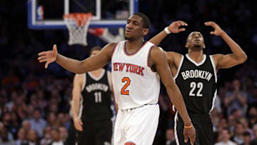 Apr 1, 2016; New York, NY, USA; New York Knicks guard Langston Galloway (2) celebrates as Brooklyn Nets guard Markel Brown (22) reacts during the second half at Madison Square Garden. The Knicks defeated the Nets 105-91. Mandatory Credit: Adam Hunger-USA TODAY Sports