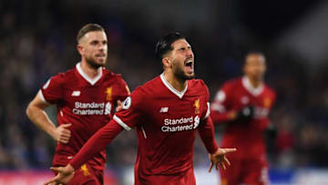 HUDDERSFIELD, ENGLAND - JANUARY 30: Emre Can of Liverpool (R) celebrates as he scores their first goal with Jordan Henderson during the Premier League match between Huddersfield Town and Liverpool at John Smith's Stadium on January 30, 2018 in Huddersfield, England. (Photo by Gareth Copley/Getty Images)