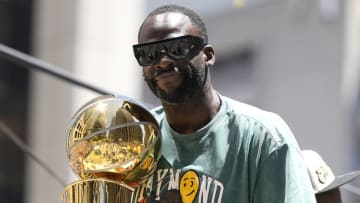 SAN FRANCISCO, CALIFORNIA - JUNE 20: Draymond Green #23 of the Golden State Warriors celebrates with the NBA Championship Trophy during the Golden State Warriors Victory Parade on June 20, 2022 in San Francisco, California. The Golden State Warriors beat the Boston Celtics 4-2 to win the 2022 NBA Finals. NOTE TO USER: User expressly acknowledges and agrees that, by downloading and or using this photograph, User is consenting to the terms and conditions of the Getty Images License Agreement. (Photo by Thearon W. Henderson/Getty Images)(Photo by Thearon W. Henderson/Getty Images)