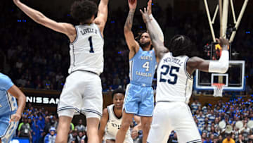 Duke basketball center Dereck Lively blocks RJ Davis (Rob Kinnan-USA TODAY Sports)