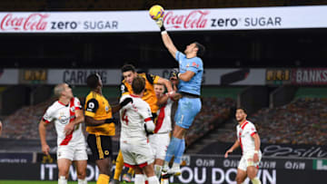 WOLVERHAMPTON, ENGLAND - NOVEMBER 23: Alex McCarthy of Southampton with Coca Cola Zero sugar advert in background during the Premier League match between Wolverhampton Wanderers and Southampton at Molineux on November 23, 2020 in Wolverhampton, United Kingdom. Sporting stadiums around the UK remain under strict restrictions due to the Coronavirus Pandemic as Government social distancing laws prohibit fans inside venues resulting in games being played behind closed doors. (Photo by Sam Bagnall - AMA/Getty Images)
