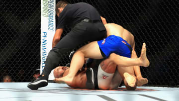 ANAHEIM, CA - JULY 29: Drew Dober (top) defeats Joshua Berkman during their Flyweight bout at UFC 214 at Honda Center on July 29, 2017 in Anaheim, California. (Photo by Sean M. Haffey/Getty Images)