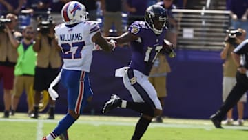 Sep 11, 2016; Baltimore, MD, USA; Baltimore Ravens wide receiver Mike Wallace (17) stiff arms Buffalo Bills strong safety Duke Williams (27) during the second quarter at M&T Bank Stadium. Mandatory Credit: Tommy Gilligan-USA TODAY Sports