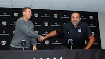 SACRAMENTO, CA - JUNE 24: Head Coach Dave Joerger and General Manager Vlade Divac of the Sacramento Kings address the media at a press conference on September 27, 2017 at the Golden 1 Center in Sacramento, California. NOTE TO USER: User expressly acknowledges and agrees that, by downloading and/or using this Photograph, user is consenting to the terms and conditions of the Getty Images License Agreement. Mandatory Copyright Notice: Copyright 2017 NBAE (Photo by Rocky Widner/NBAE via Getty Images)