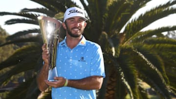PACIFIC PALISADES, CALIFORNIA - FEBRUARY 21: Max Homa of the United States poses with the trophy after defeating Tony Finau of the United States (not pictured) in a playoff to win The Genesis Invitational at Riviera Country Club on February 21, 2021 in Pacific Palisades, California. (Photo by Harry How/Getty Images)