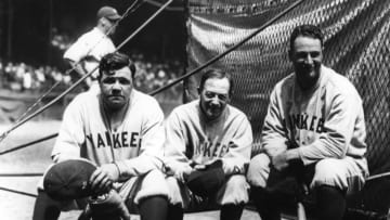 NEW YORK - 1927. (L-R) Babe Ruth, outfielder, Miller Huggins, manager, and Lou Gehrig, first baseman, all of the New York Yankees, take a break at the batting cage before a game in Yankee Stadium before a game in the 1927 season. (Photo by Mark Rucker/Transcendental Graphics, Getty Images)