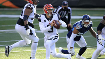 CINCINNATI, OHIO - NOVEMBER 01: Quarterback Joe Burrow #9 of the Cincinnati Bengals rolls right and looks to make a pass play in the third quarter of the game against the Tennessee Titans at Paul Brown Stadium on November 01, 2020 in Cincinnati, Ohio. (Photo by Andy Lyons/Getty Images)