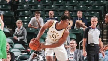 INDIANAPOLIS, IN - OCTOBER 10: Ike Anigbogu #13 of the Indiana Pacers handles the ball during the preseason game against the Maccabi Haifa on October 10, 2017 at Bankers Life Fieldhouse in Indianapolis, Indiana. NOTE TO USER: User expressly acknowledges and agrees that, by downloading and or using this Photograph, user is consenting to the terms and conditions of the Getty Images License Agreement. Mandatory Copyright Notice: Copyright 2017 NBAE (Photo by Ron Hoskins/NBAE via Getty Images)