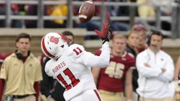 Nov 7, 2015; Boston, MA, USA; North Carolina State Wolfpack cornerback Juston Burris (11) intercepts a pass during the first half against the Boston College Eagles at Alumni Stadium. Mandatory Credit: Bob DeChiara-USA TODAY Sports