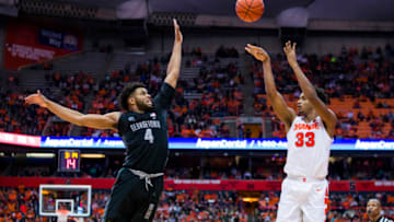 SYRACUSE, NY - DECEMBER 08: Elijah Hughes #33 of the Syracuse Orange shoots the ball during the second half against Jagan Mosely #4 of the Georgetown Hoyas at the Carrier Dome on December 8, 2018 in Syracuse, New York. Syracuse defeated Georgetown 72-71. (Photo by Brett Carlsen/Getty Images)