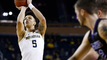 Dec 13, 2016; Ann Arbor, MI, USA; Michigan Wolverines forward D.J. Wilson (5) takes a free throw in the first half against the Central Arkansas Bears at Crisler Center. Mandatory Credit: Rick Osentoski-USA TODAY Sports