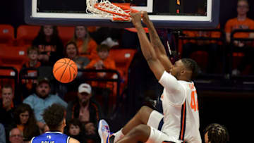 Nov 7, 2022; Champaign, Illinois, USA; Illinois Fighting Illini forward Dain Dainja (42) dunks the ball during the second half against the Eastern Illinois Panthers at State Farm Center. Mandatory Credit: Ron Johnson-USA TODAY Sports