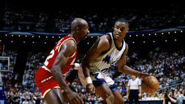 ORLANDO, FL - JUNE 7: Nick Anderson #25 of the Orlando Magic posts up against Clyde Drexler #21 of the Houston Rockets in Game One of the 1995 NBA Finals at the Orlando Arena June 7, 1995 in Orlando, Florida. The Rockets won 120-118. NOTE TO USER: User expressly acknowledges that, by downloading and or using this photograph, User is consenting to the terms and conditions of the Getty Images License agreement. Mandatory Copyright Notice: Copyright 1995 NBAE (Photo by Nathaniel S. Butler/NBAE via Getty Images)