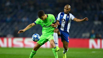 PORTO, PORTUGAL - NOVEMBER 28: Franco Di Santo of FC Schalke 04 battles for possession with Yacine Brahimi of FC Porto during the UEFA Champions League Group D match between FC Porto and FC Schalke 04 at Estadio do Dragao on November 28, 2018 in Porto, Portugal. (Photo by Octavio Passos/Getty Images)