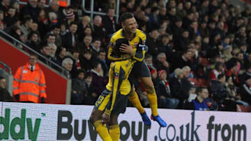 SOUTHAMPTON, ENGLAND - JANUARY 28: Danny Welbeck celebrates scoring the 1st Arsenal goal with Kieran Gibbs during the Emirates FA Cup Fourth Round match between Southampton and Arsenal at St Mary's Stadium on January 28, 2017 in Southampton, England. (Photo by Stuart MacFarlane/Arsenal FC via Getty Images)